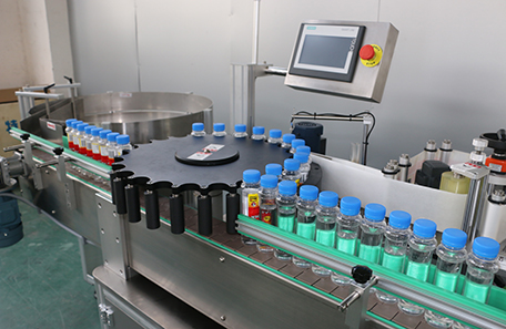 高速圓瓶調(diào)味料瓶貼標(biāo)機(jī)